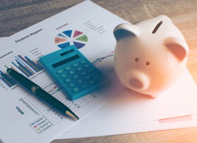 Tools for Budgeting: Pencil, Calculator, Piggy Bank